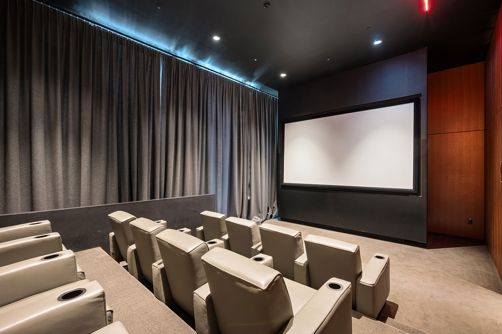 Beautiful on-site movie theater amenity with comfortable seating, 685 First Avenue, Murray Hill apartments for rent