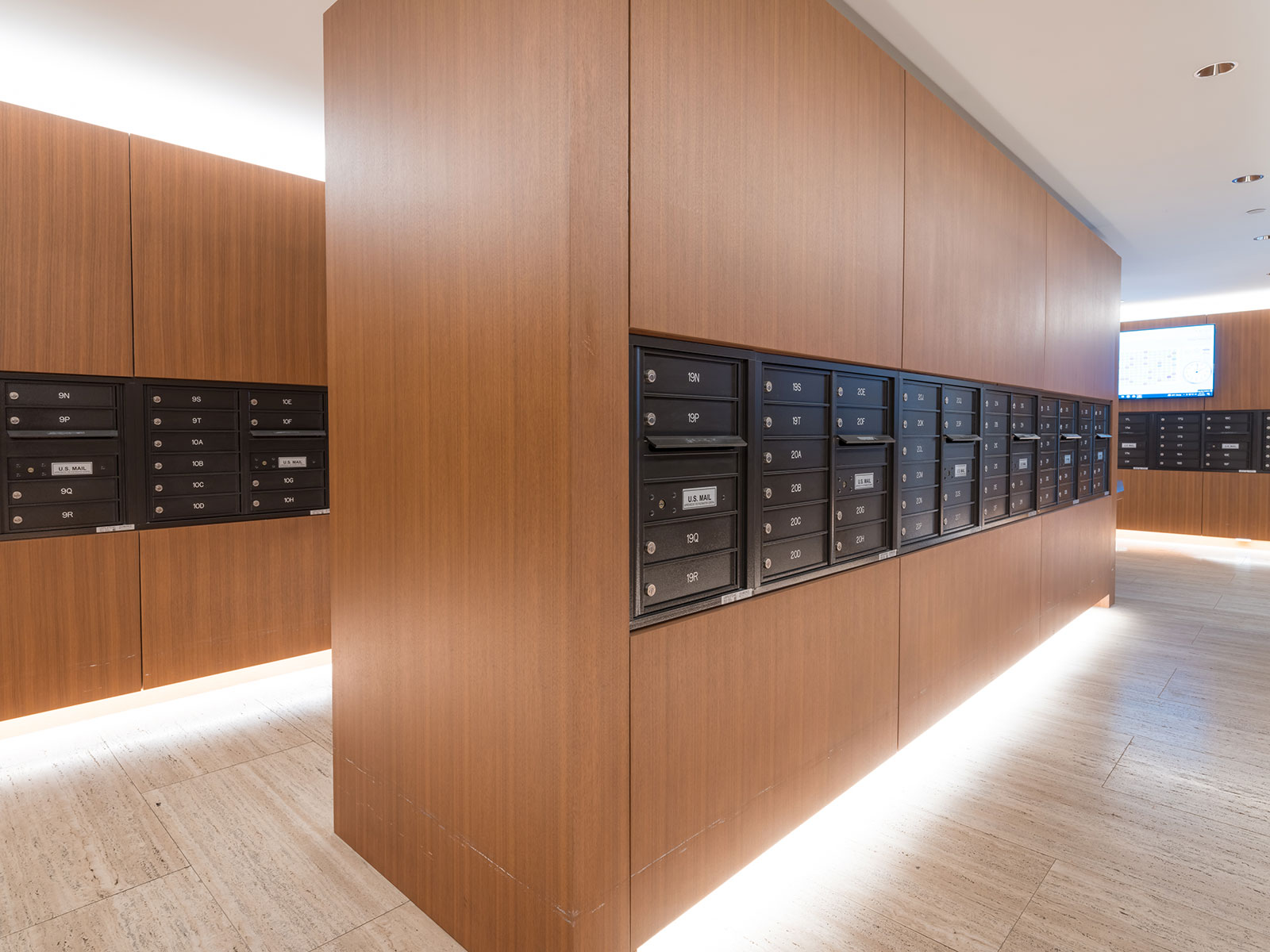 Organized, secure package room with locked shelves for safe delivery storage at 685 First Avenue, apartments for rent in Murray Hill.