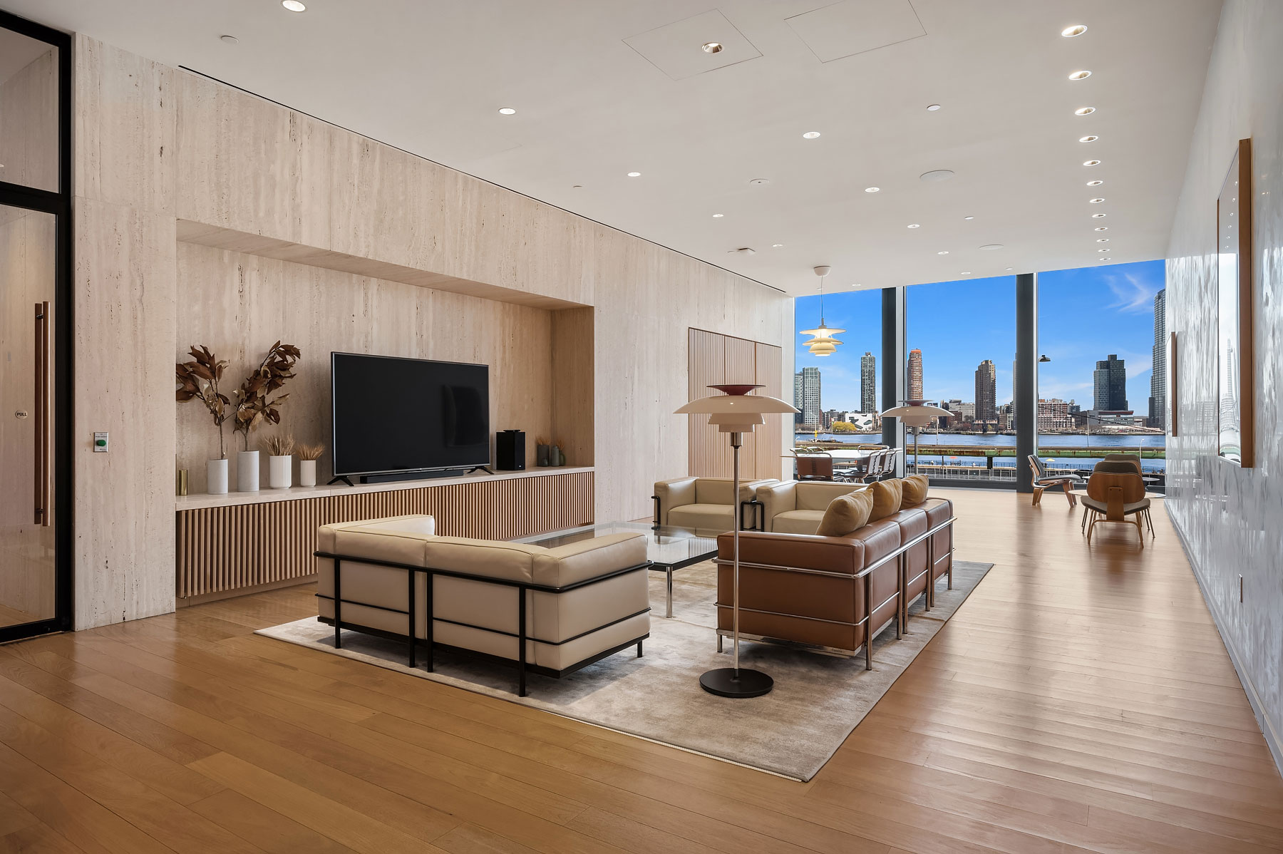 Gorgeous luxury residence with beautiful views and a large TV at 685 1st Avenue, apartments for rent in Murray Hill.